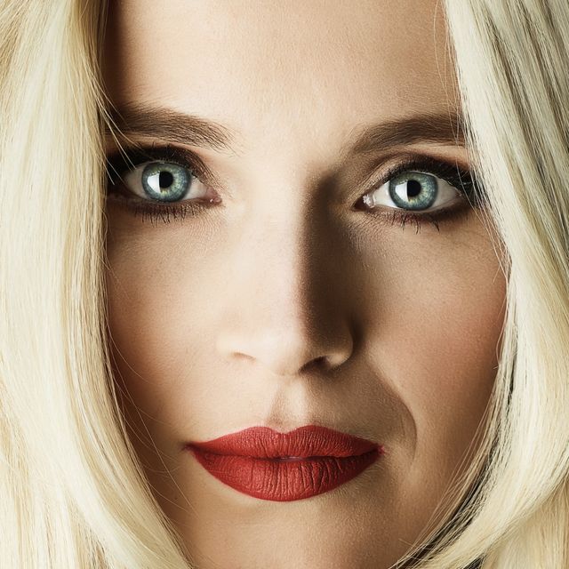 Close up image of woman showing makeup skills